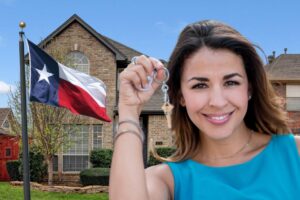 A picture of a lady holding a key in front of a home and a Texas flag