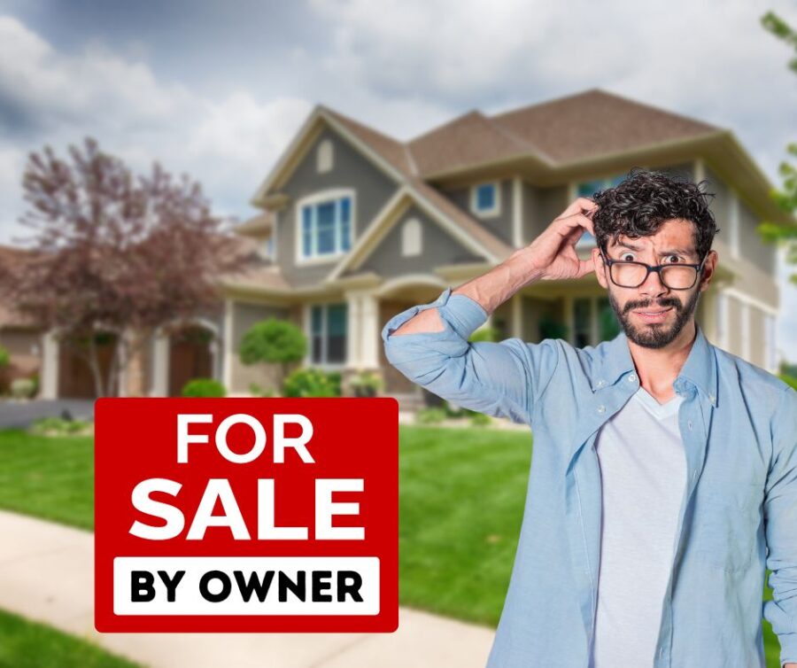 Frustrated homeowner standing in front of a "For Sale By Owner" sign in their yard, indicating the difficulties of selling a home without professional help.